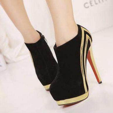 black and gold high heel boots